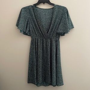 Green polka dot wrap dress